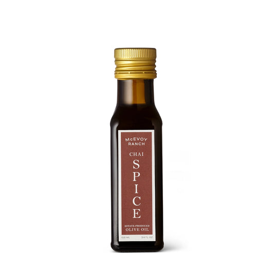 Bottle of McEvoy Ranch Chai Spice olive oil on a white background