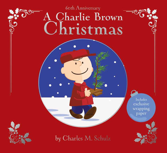 Book cover of 'A Charlie Brown Christmas' with a red background and circular illustration of Charlie Brown holding a tree.