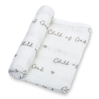 Two white swaddles with 'Child of God' text and heart designs on a white background