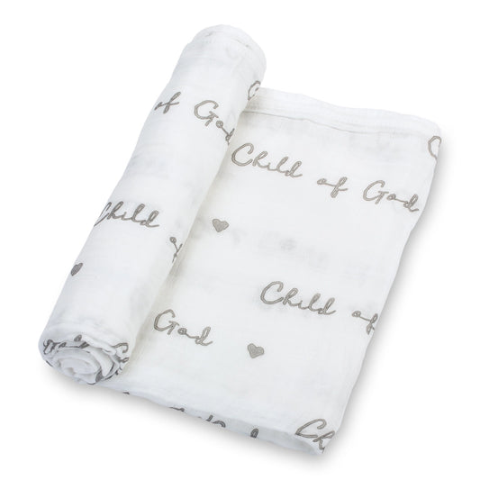 Two white swaddles with 'Child of God' text and heart designs on a white background