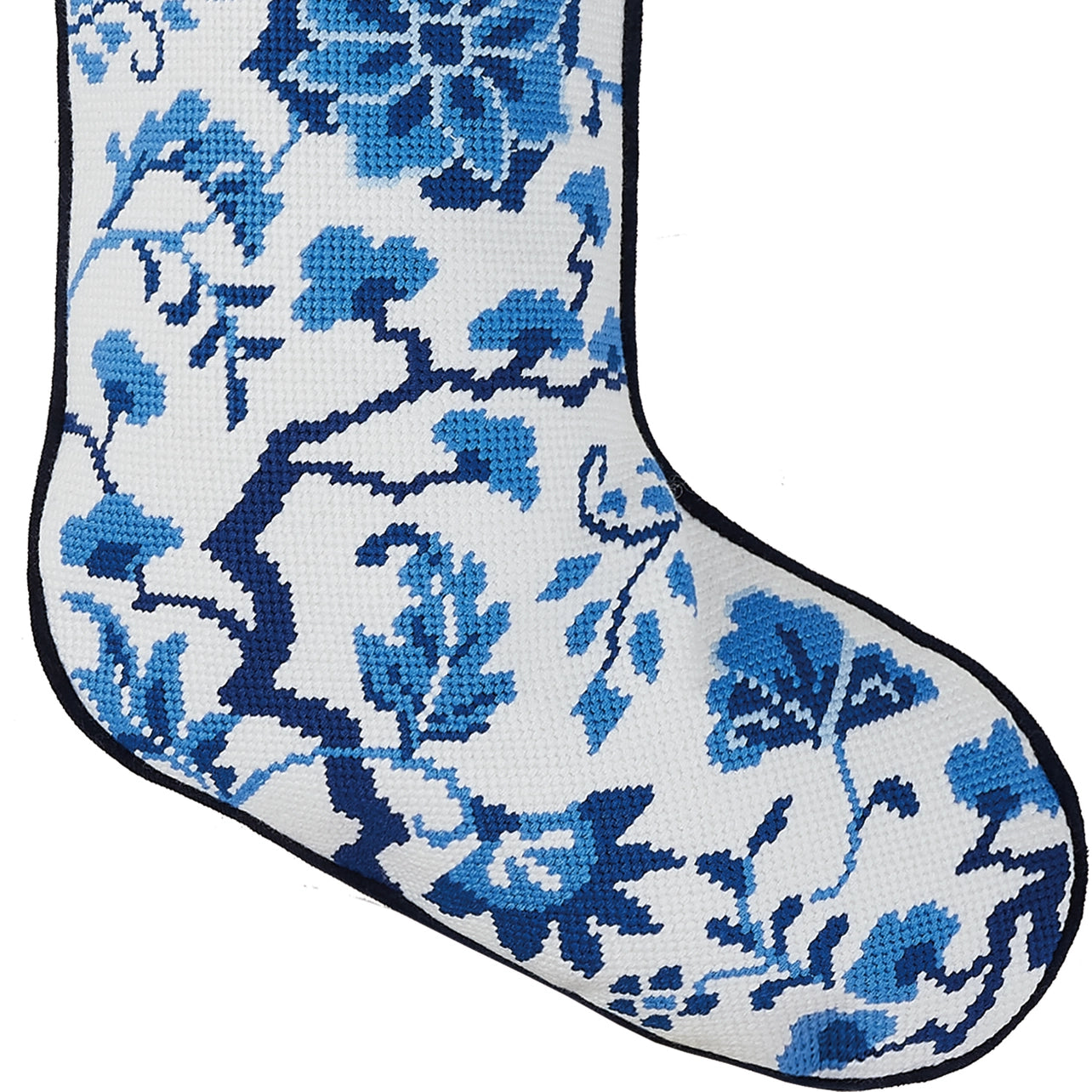 Blue floral Chinoiserie wool needlepoint detail on white Christmas stocking
