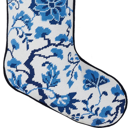Blue floral Chinoiserie wool needlepoint detail on white Christmas stocking
