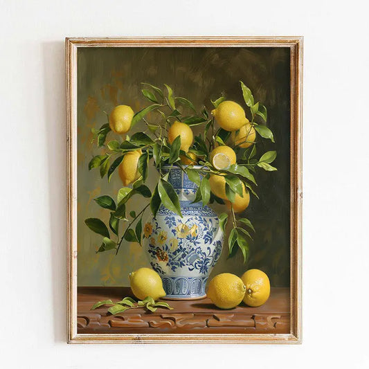 Framed artwork of lemons and a decorative vase on a wooden surface.