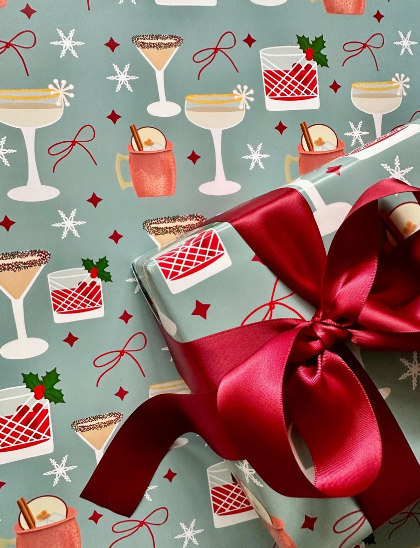 Gift box with a red ribbon on a background with Christmas-themed illustrations of cocktails and presents.