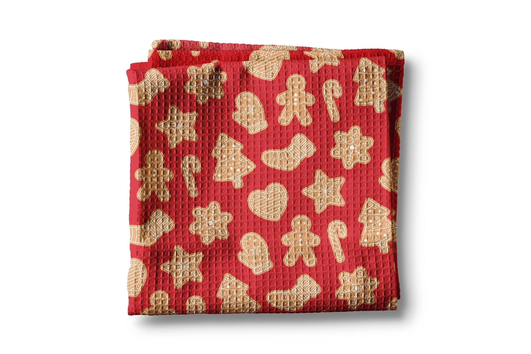 Red waffle-textured towel with gingerbread pattern on a white background