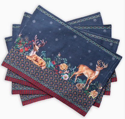 Set of blue napkins with deer and floral patterns on a white background