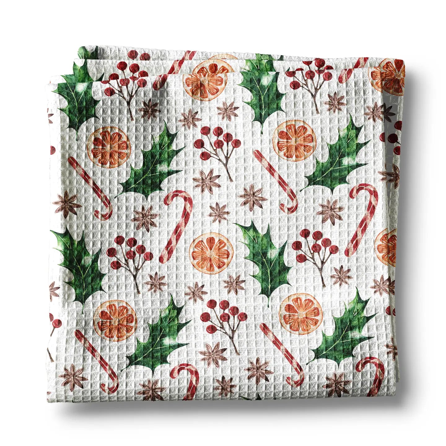 Waffle-textured towel with Christmas-themed pattern on a white background