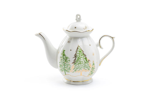 White teapot with Christmas tree design on a white background