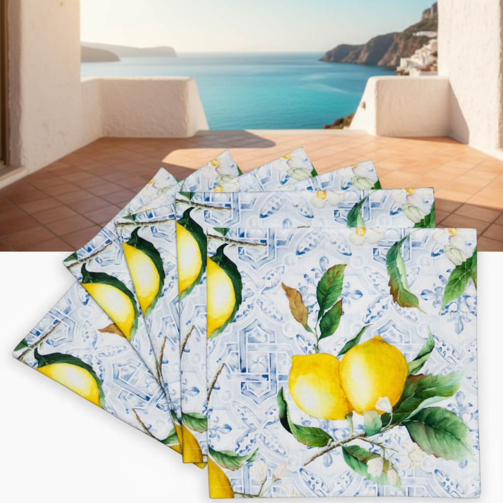 Set of four napkins with lemon and leaf pattern on a white background