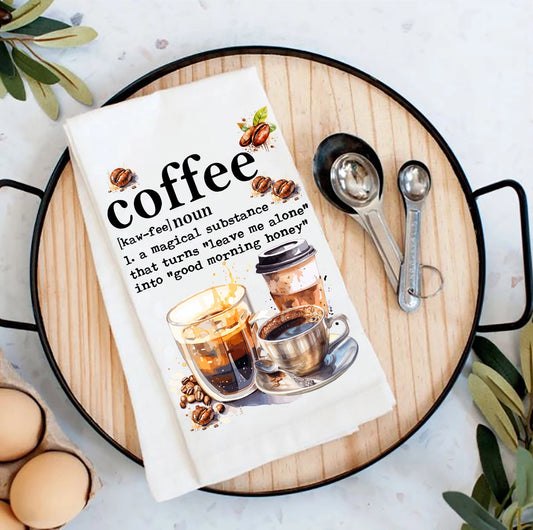 Book titled 'coffee' with coffee-themed illustrations on a wooden tray.