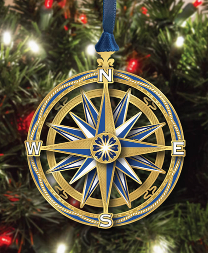Decorative compass ornament on a Christmas tree