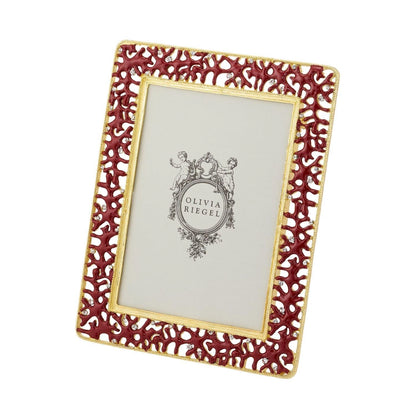 Decorative photo frame with red coral-like design and gold accents on a white background