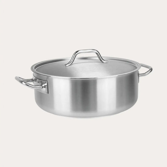 Stainless steel pot with lid on a white background