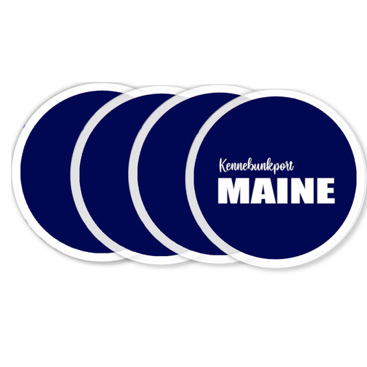 Set of four blue coasters with 'Kennebunkport Maine' text on a white background