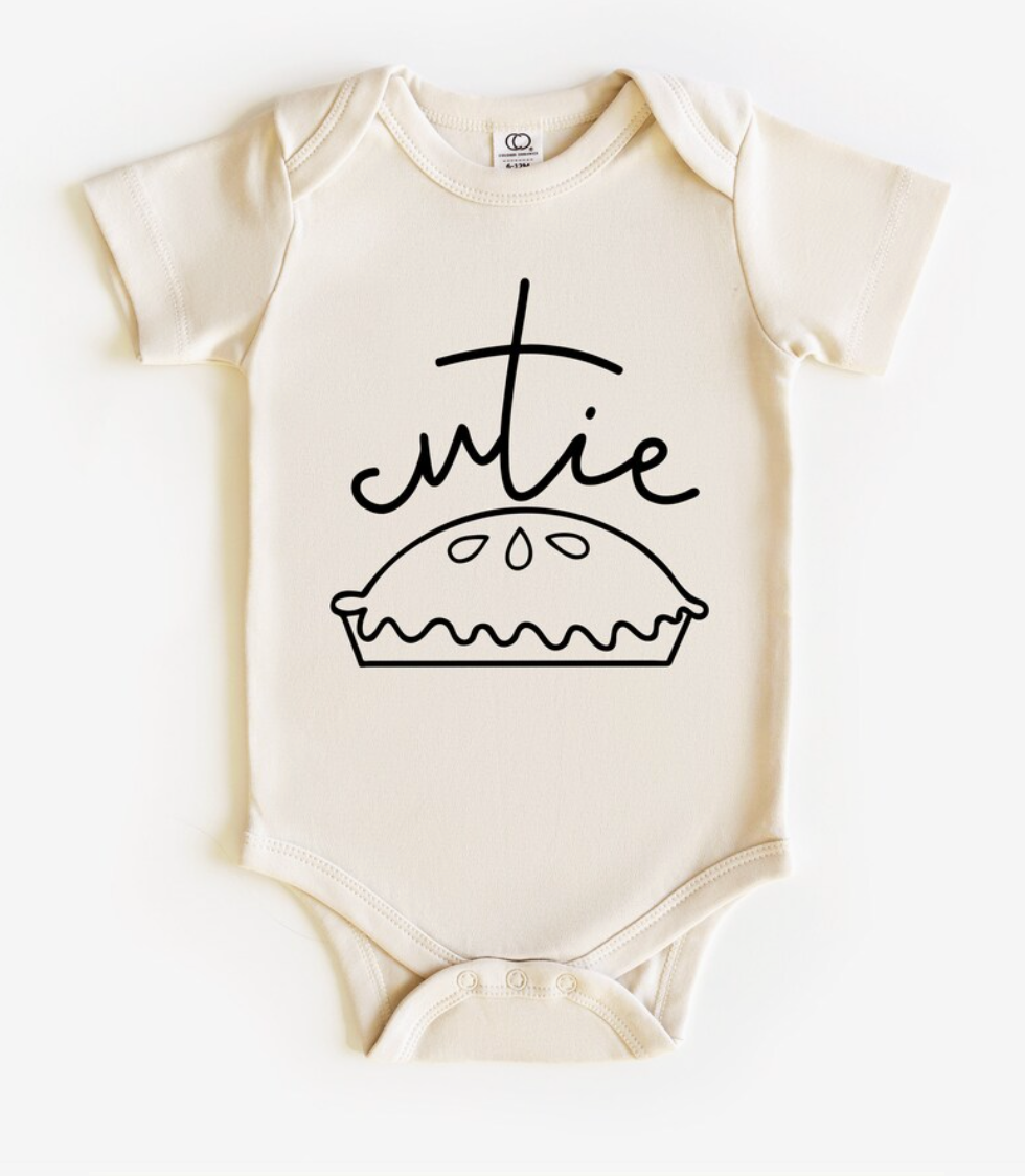 Baby onesie with 'cutie pie' design on a white background