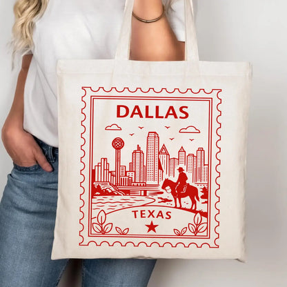 Tote bag with 'Dallas, Texas' design held by a person