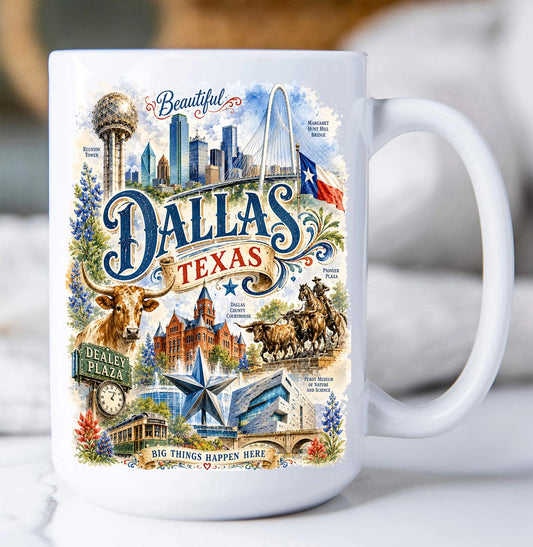 A white ceramic mug featuring a colorful illustrated graphic of Dallas, Texas, with the large word 'DALLAS' and smaller landmarks and cultural imagery including a cowboy on horseback, Reale Plaza, and the Dallas skyline.