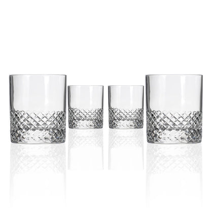 Set of four crystal tumblers with diamond pattern on a white background