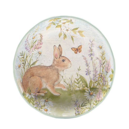Decorative plate with a rabbit and butterfly design on a white background