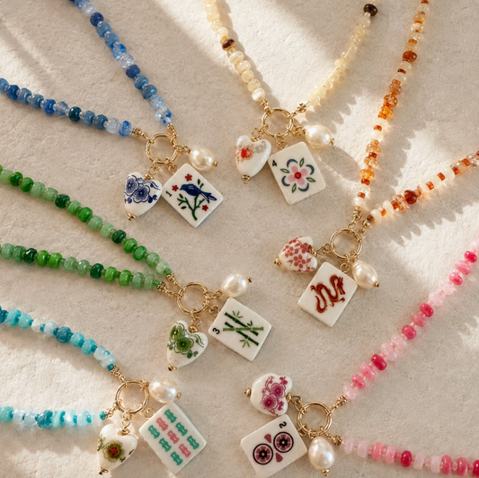 Ellison + Young Mahjong Tile Charm Beaded Necklaces in six colorful styles with Mahjong tile, decorative heart and faux pearl charms.