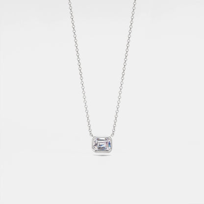 Diamond necklace with a rectangular pendant on a light gray background