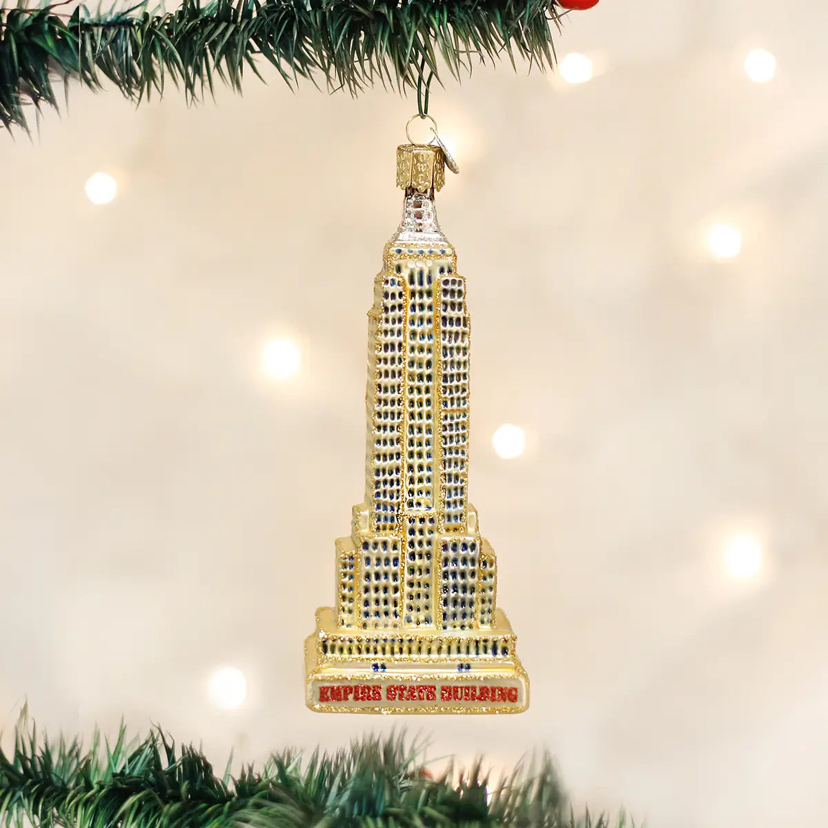 Christmas ornament of the Empire State Building on a decorated tree