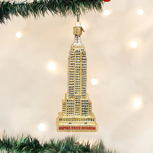 Christmas ornament of the Empire State Building on a decorated tree