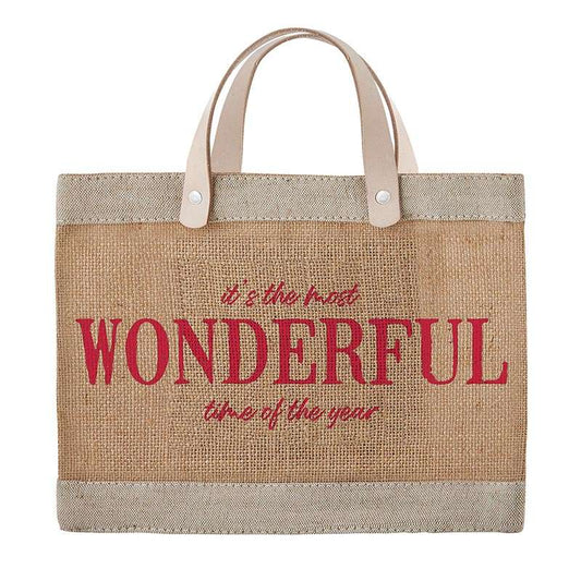 Jute bag with red text 'it's the most Wonderful time of the year' on a white background