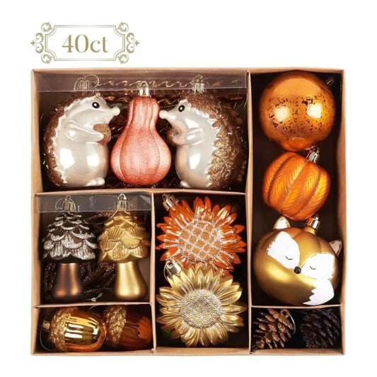 Decorative ornaments including hedgehogs, pumpkins, and foxes in a box with '40oct' branding.