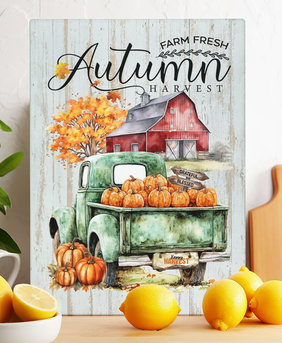 Farm Fresh Autumn Harvest glass trivet featuring a vintage green pickup truck filled with pumpkins in front of a red barn