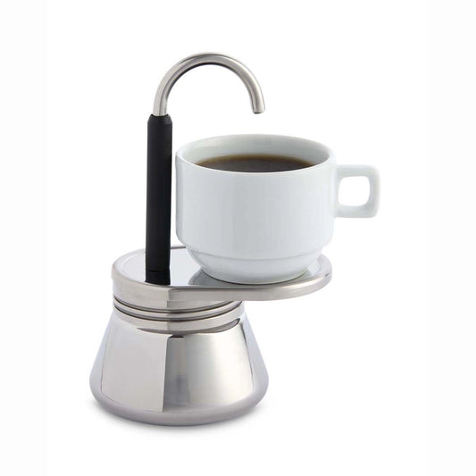 Stainless steel espresso maker with a white cup of coffee on a white background