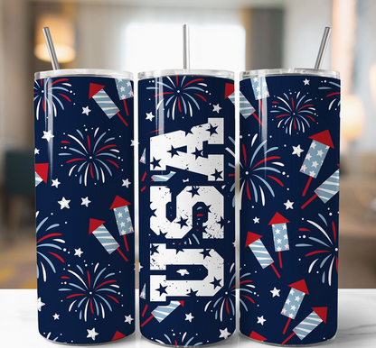 Three tumblers with USA-themed designs featuring fireworks and stars on a blurred background.