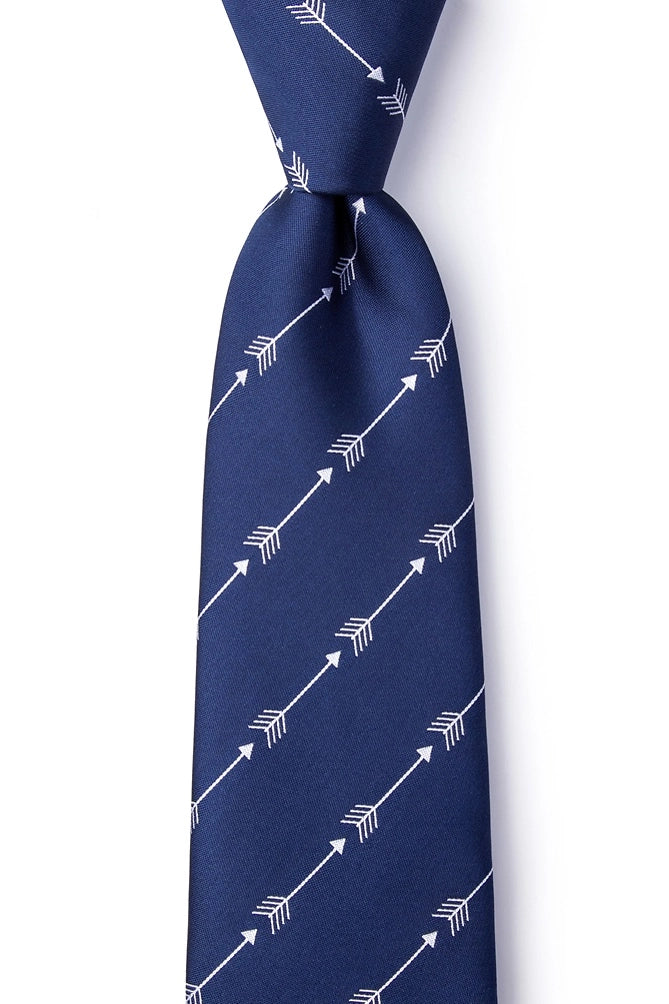 Navy blue tie with white arrow pattern on a white background