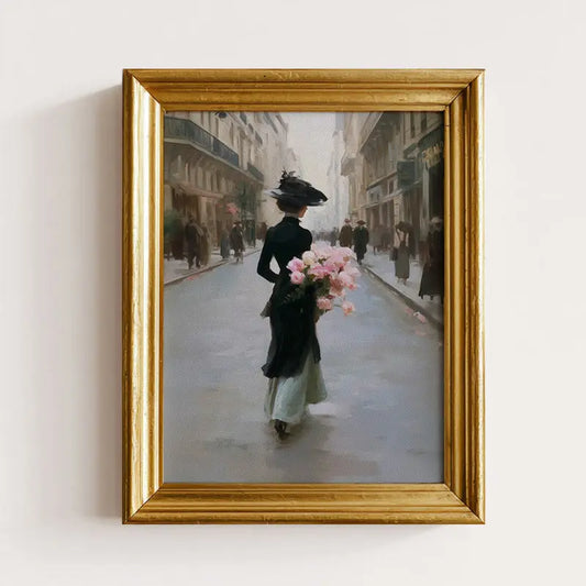 Framed painting of a woman holding flowers on a city street