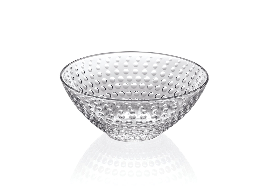 Clear glass bowl with textured surface on a white background