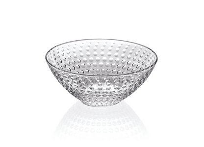 Clear glass bowl with textured surface on a white background