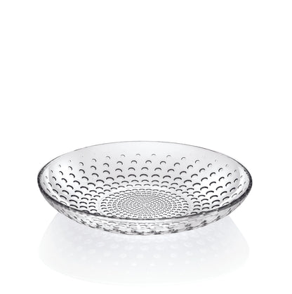 Clear glass bowl with textured design on a white background