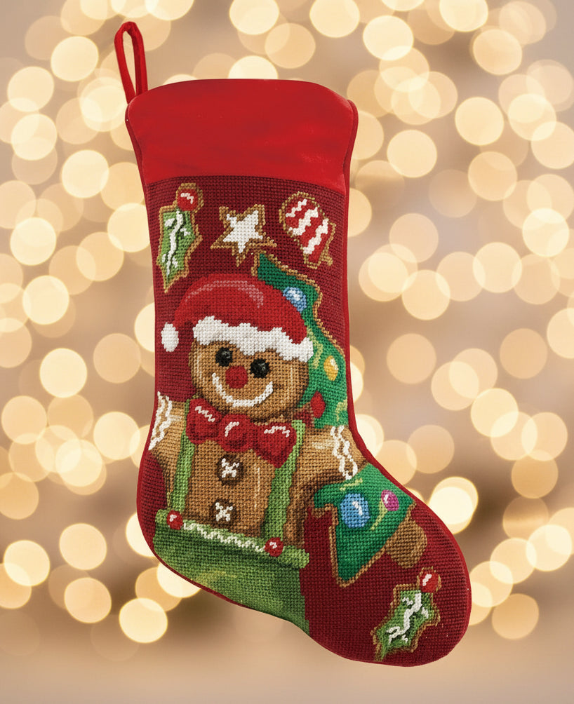 Decorative Christmas stocking with a gingerbread man design on a white background