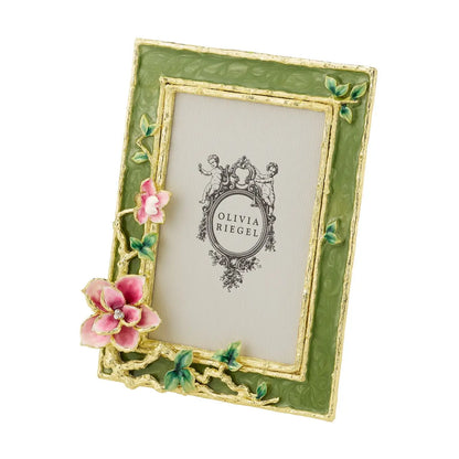Decorative photo frame with floral design and 'Olivia Riegel' branding on a white background
