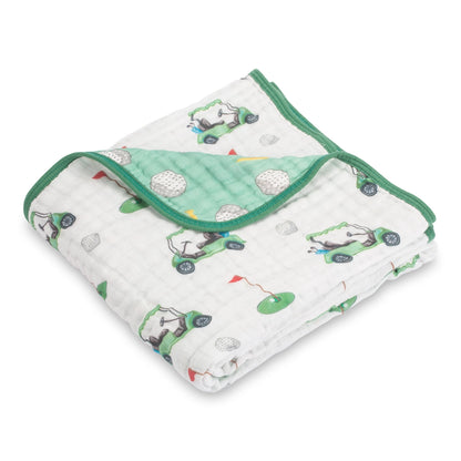 Baby blanket with golf car pattern on a white background