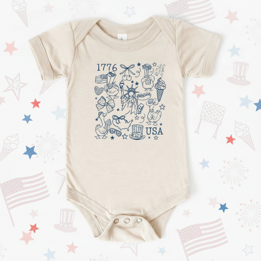Beige baby onesie with blue graphics and text on a white background