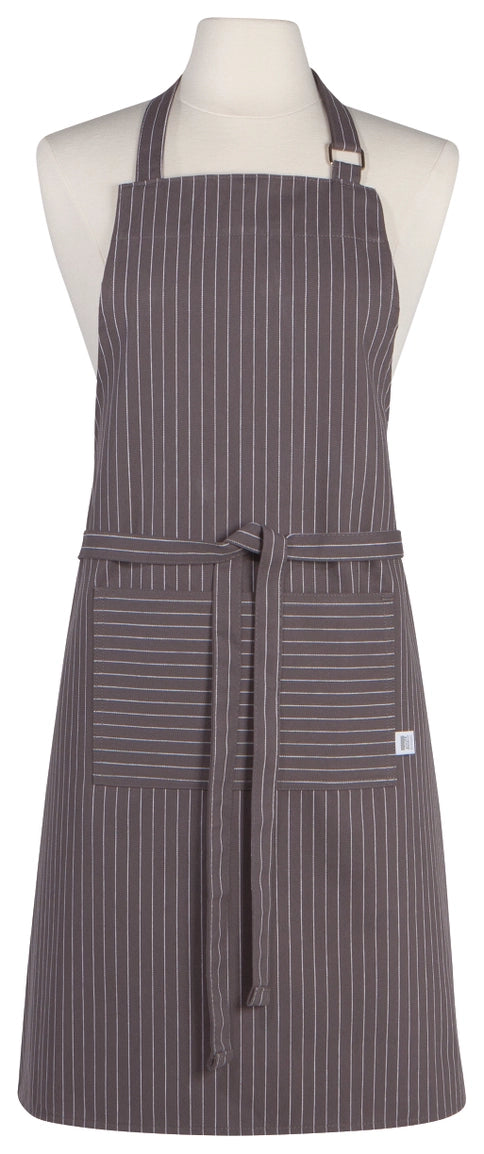 A dark gray pinstriped apron with a matching waist tie and two front pockets, displayed on a white mannequin torso against a white background.