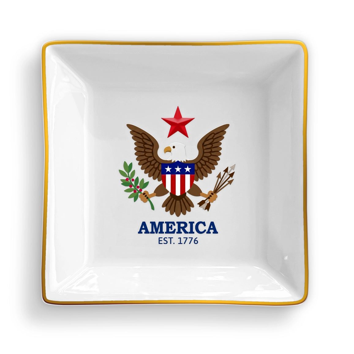 Decorative dish with an eagle emblem and 'America Est. 1776' text on a white background