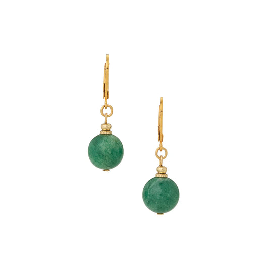 Gold earrings with green gemstones on a white background