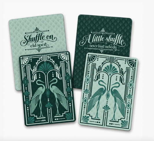 Green Light Gatsby Mahjong tile shufflers set of two in emerald and mint with Art Deco herons, geometric details and game-night sayings.