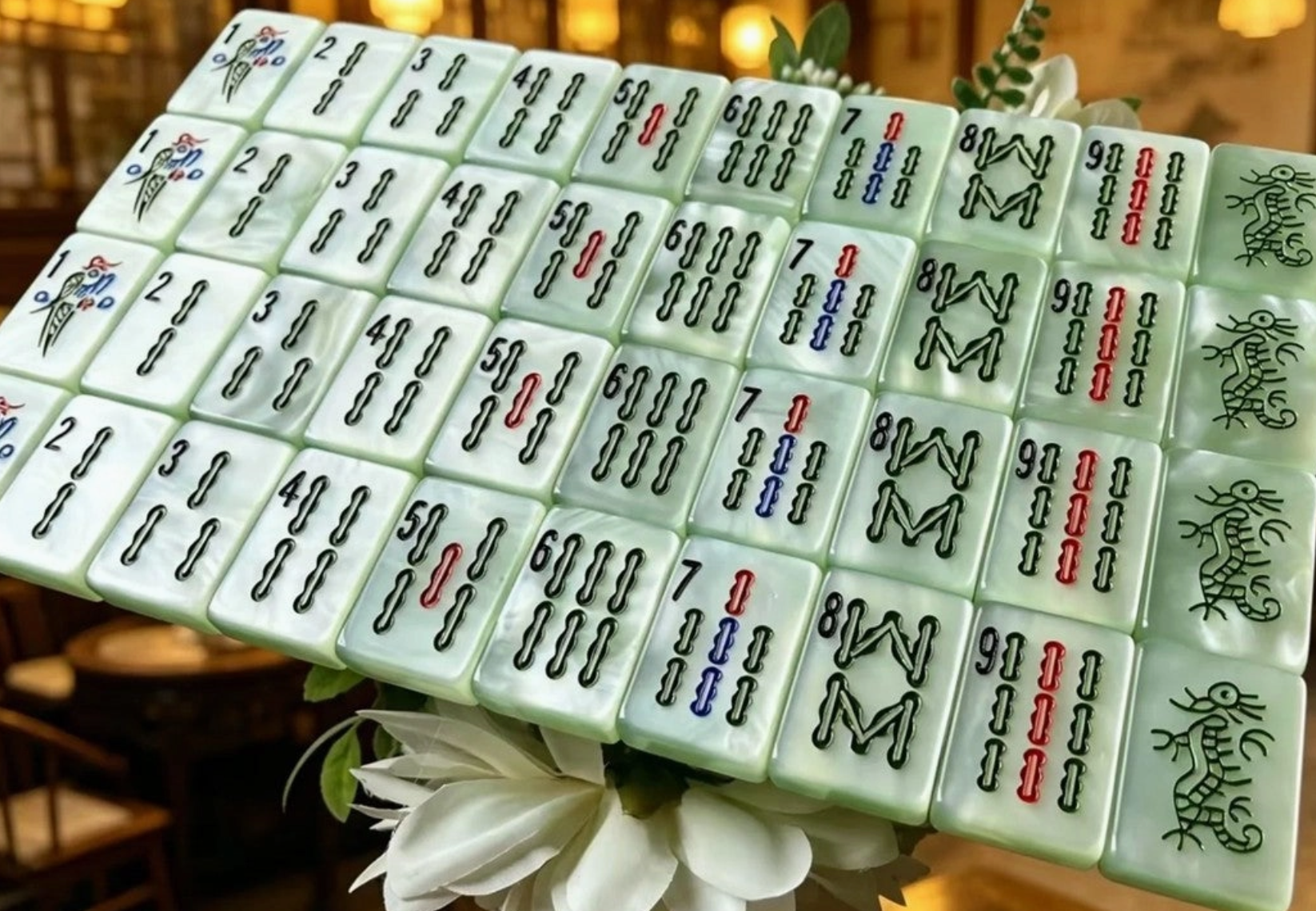 Shop the Green Pearl Traditional American Mahjong Tile Set featuring luminous pearlescent green tiles and classic-inspired designs. A beautiful gift for Mahjong players.