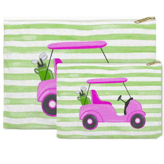 Two zippered pouches with a green and white striped background, each printed with a pink golf cart carrying green golf clubs. The larger pouch is positioned behind the smaller one, both displayed on a clean white background. NY Gift Boutique