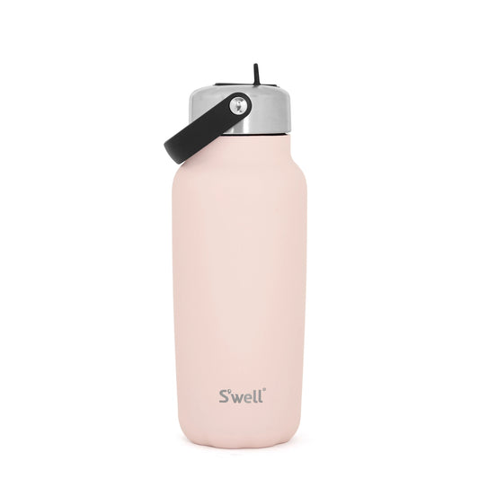 Pink water bottle with silver cap on a white background
