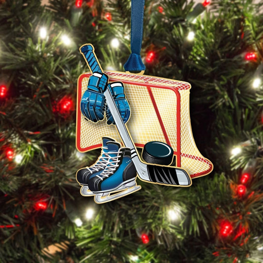 Hockey-themed ornament on a Christmas tree with lights and decorations.