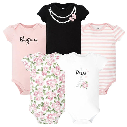 Collection of baby bodysuits with various designs and text on a white background